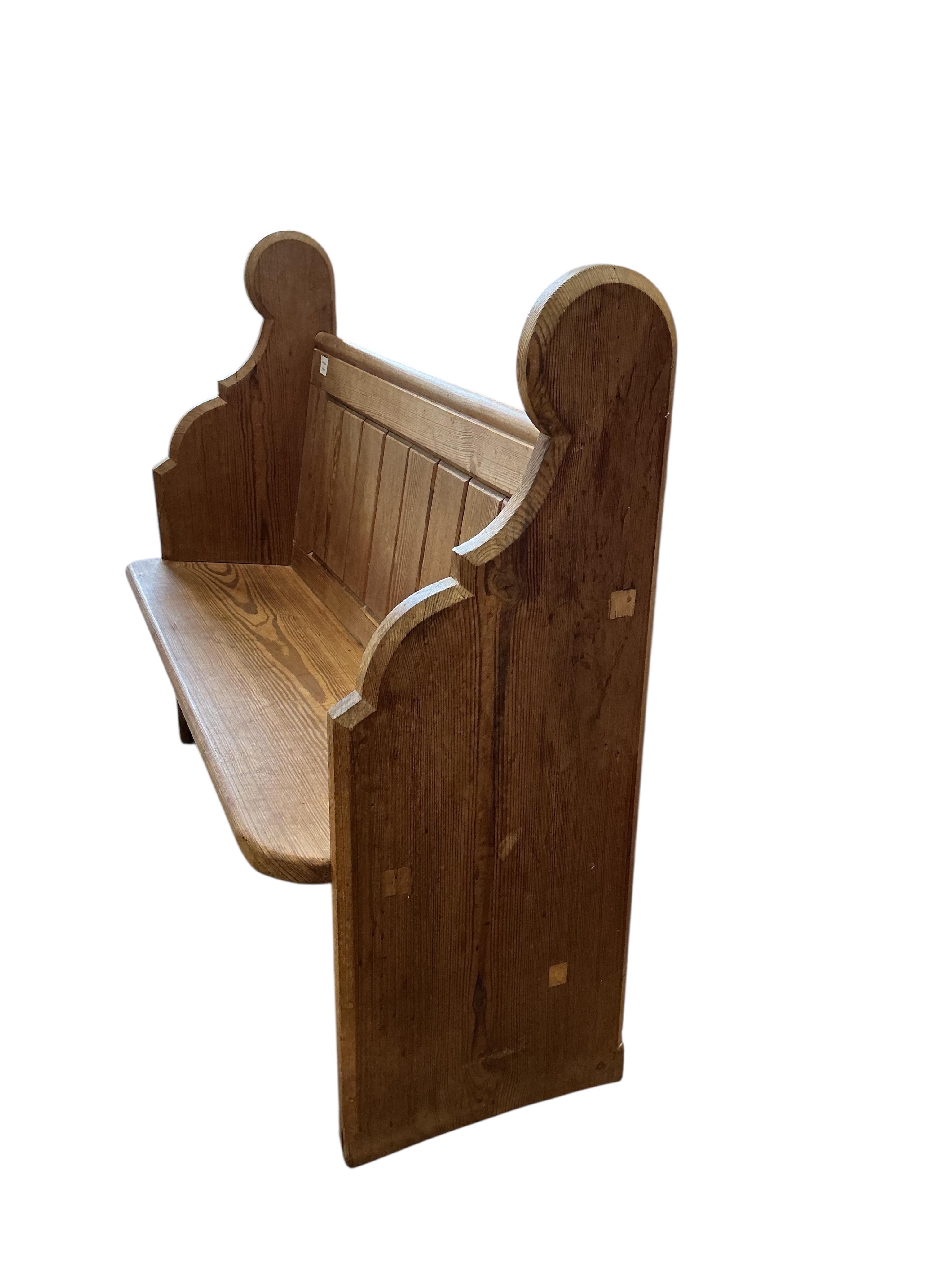 A small Victorian panelled pitch pine pew, width 119cm, depth 40cm, height 99cm